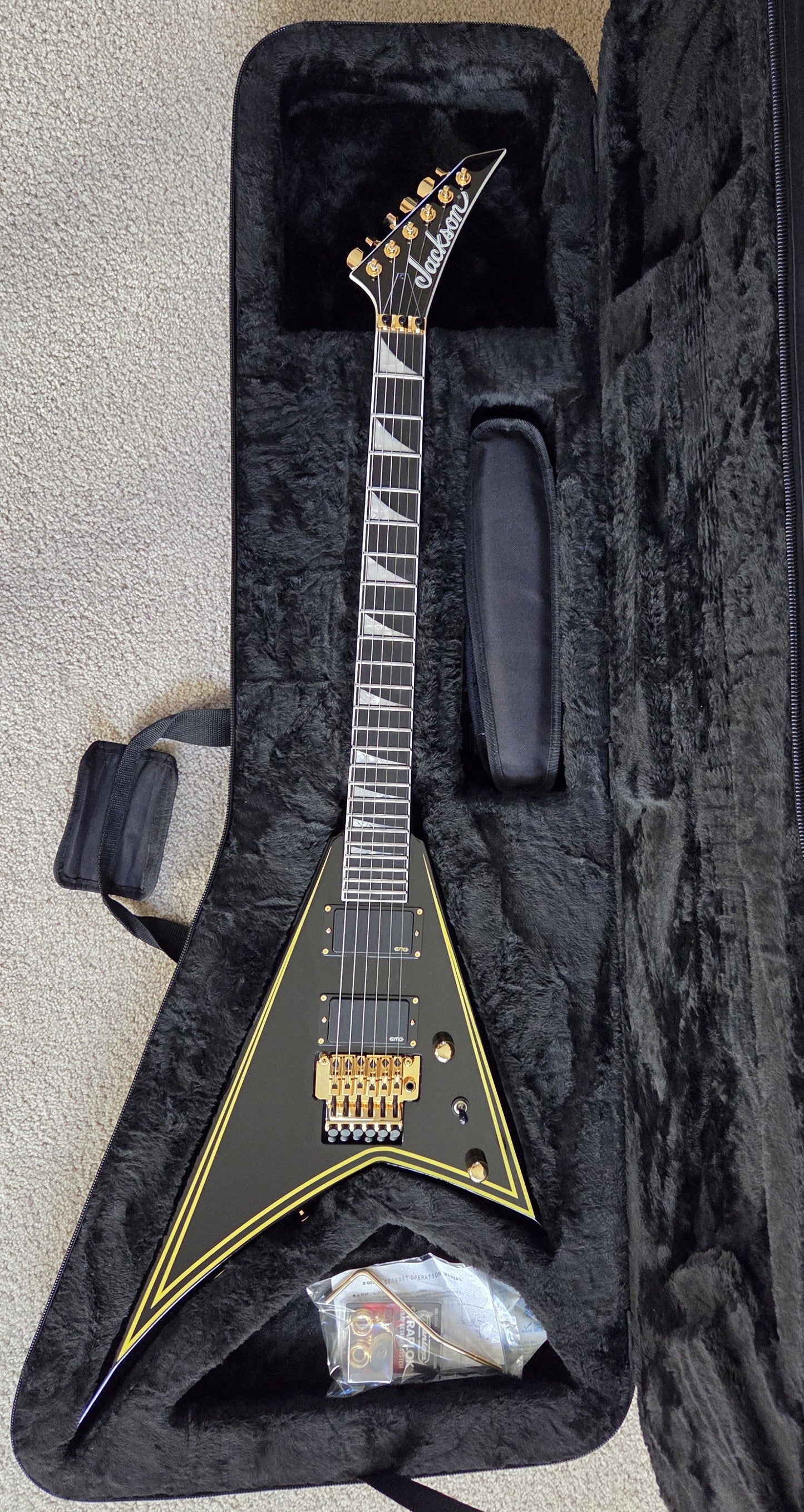 Jackson MJ Series Rhoads RR24MG Electric Guitar, Black with Yellow Pinstripes, Foam Core Fitted Case
